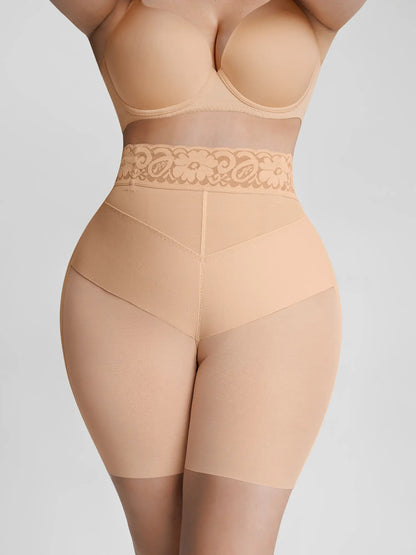 Front view of model wearing V-band tummy control shorts to instantly flatten the midsection
