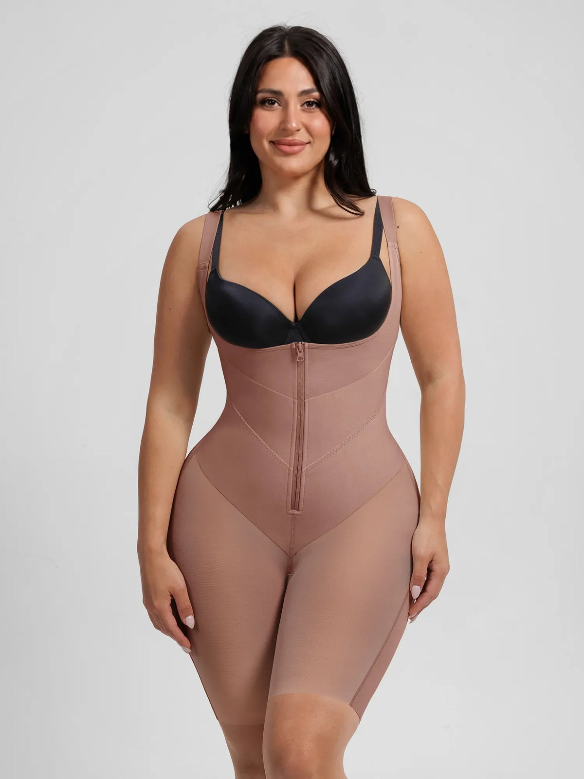 Double V compression bodysuit with tummy control, butt lifting, front zipper closure, and seamless boyshort design for all-day sculpting comfort.