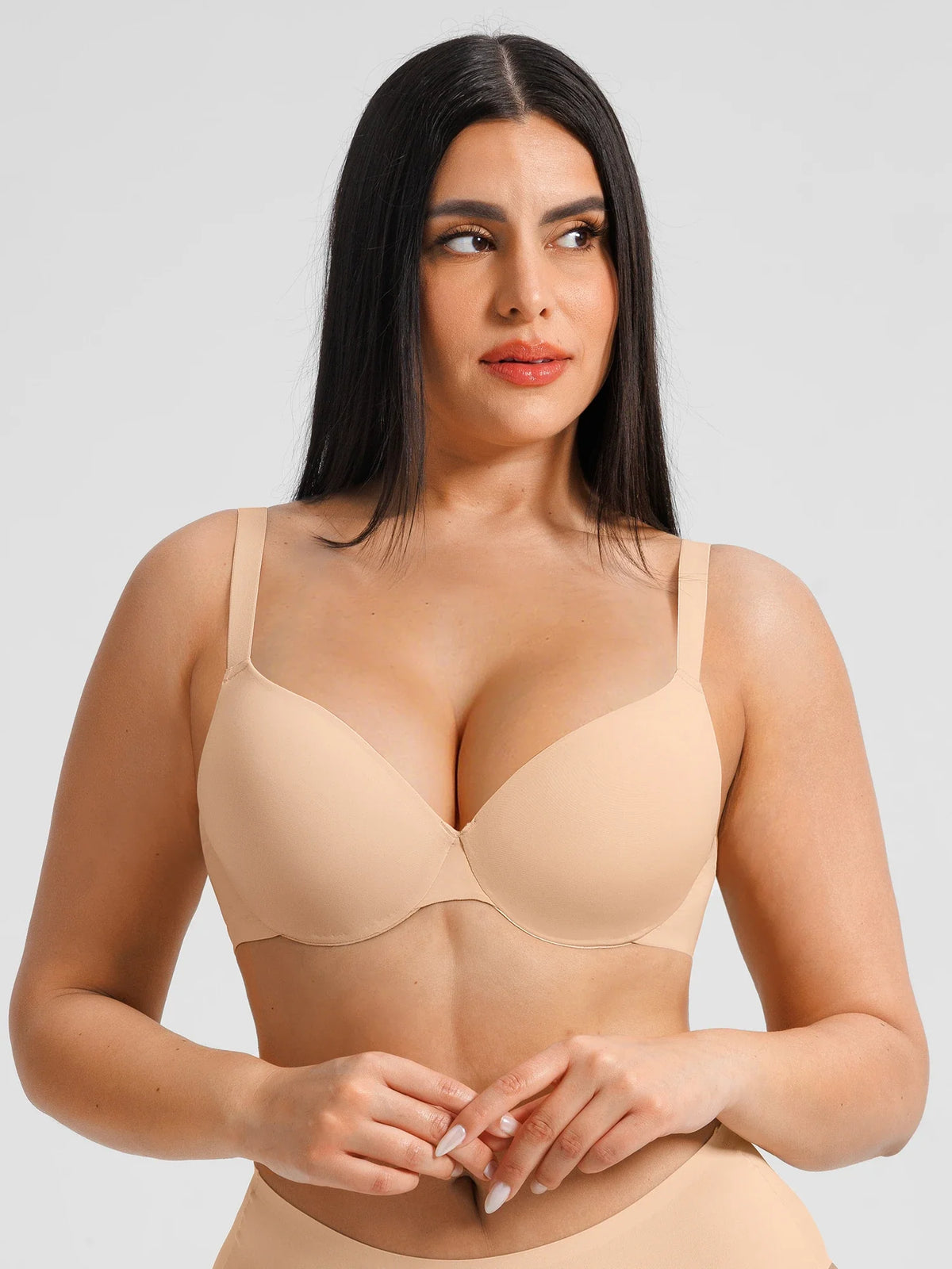 Front view of a black intelligent push-up black bra featuring a naturally lifted silhouette and invisible finish under clothing.