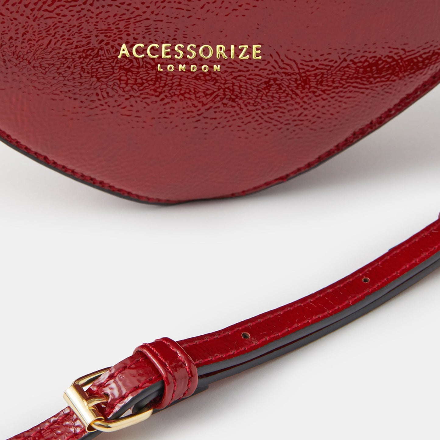 Red Patent Heart Handheld Sling