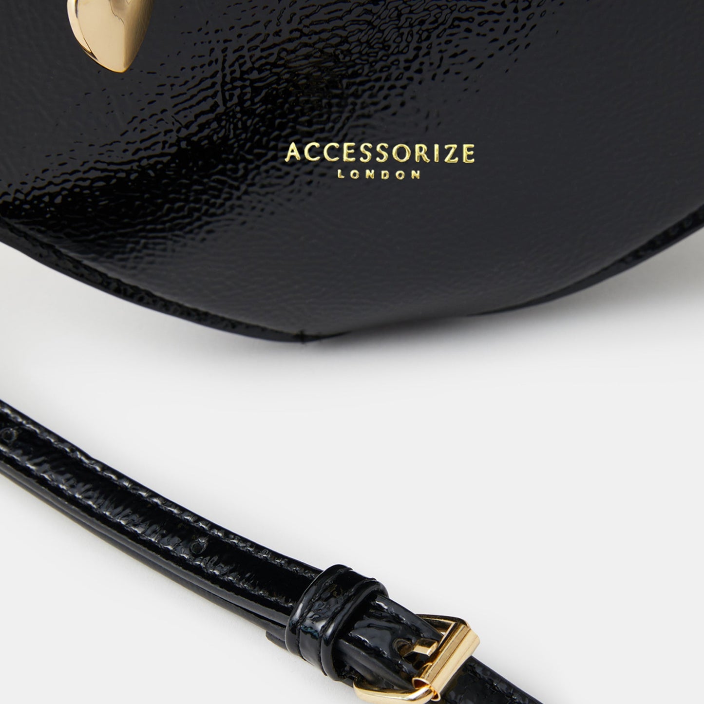 Black Patent Heart Handheld Sling