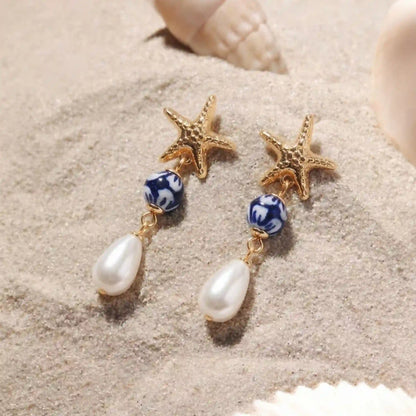 Gold Starfish Pearl Drop Earrings