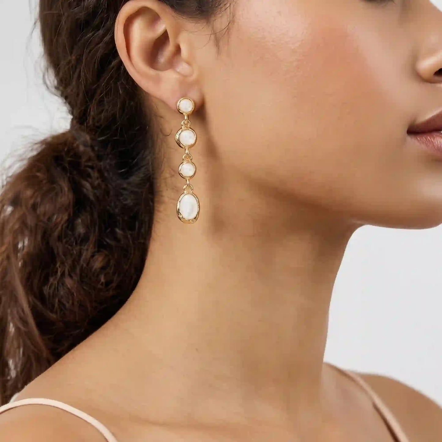 Faux pearl drop earrings in Blue