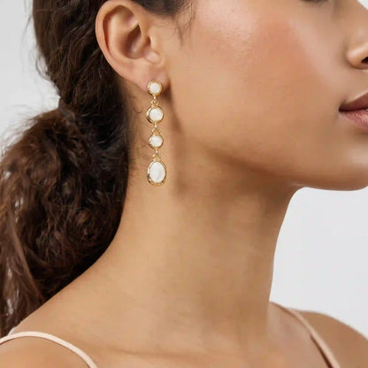 Faux pearl drop earrings in Blue