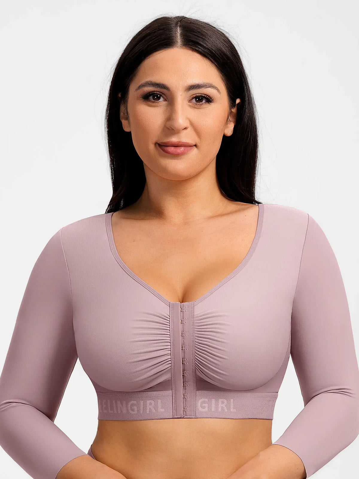 Purple post-surgery arm shaping top with 3/4 sleeves and front hook closure on a model for post-op recovery.