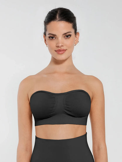 Front view of a model wearing a black seamless anti-slip bandeau bra featuring non-slip silicone grip and removable padding