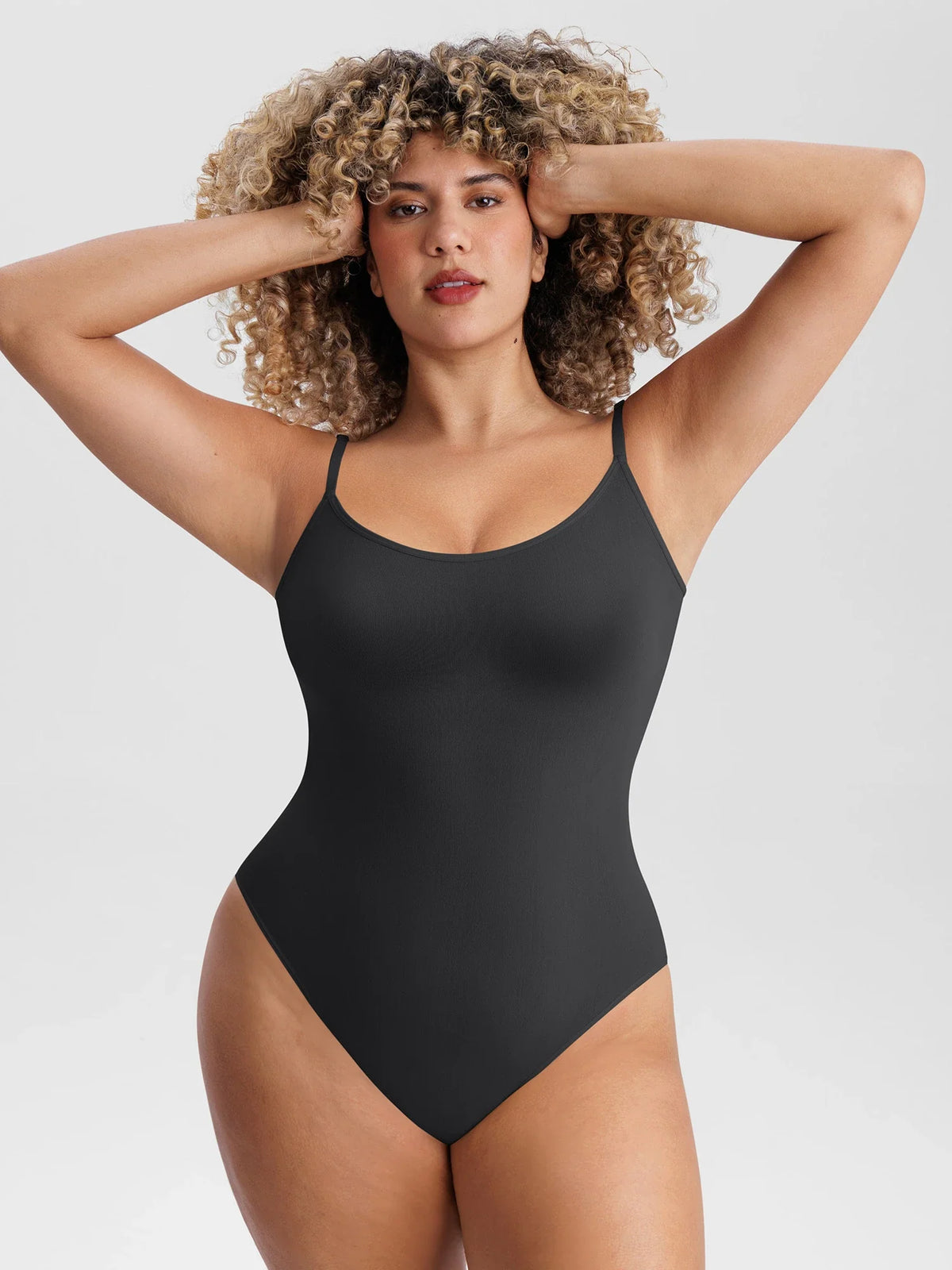 Lightweight seamless mesh bodysuit designed for sculpting comfort, breathable support, and all-day styling.