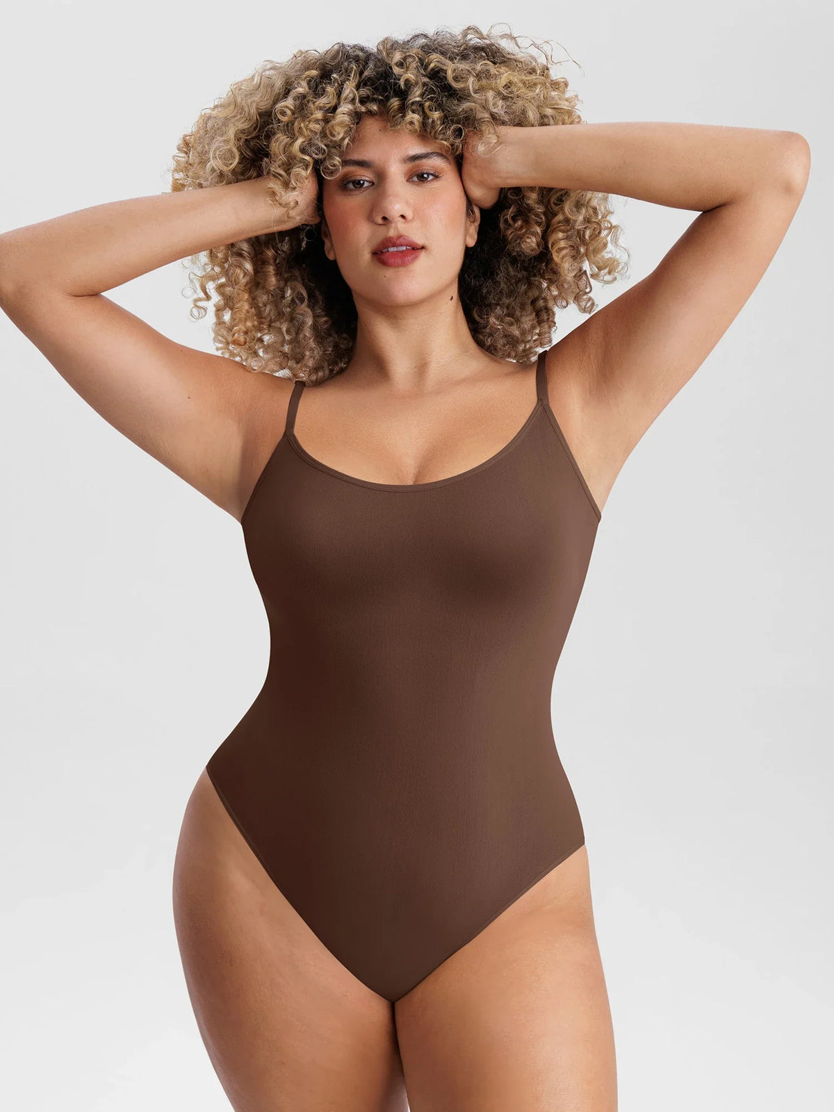 Lightweight seamless mesh bodysuit designed for sculpting comfort, breathable support, and all-day styling.