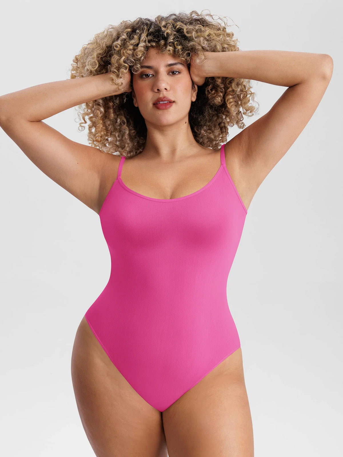 Lightweight seamless mesh bodysuit designed for sculpting comfort, breathable support, and all-day styling.