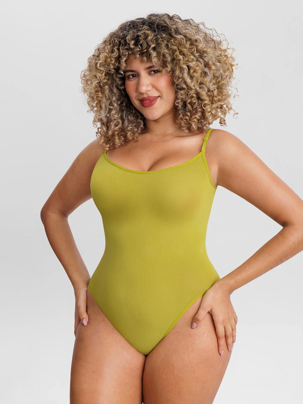 Lightweight seamless mesh bodysuit designed for sculpting comfort, breathable support, and all-day styling.