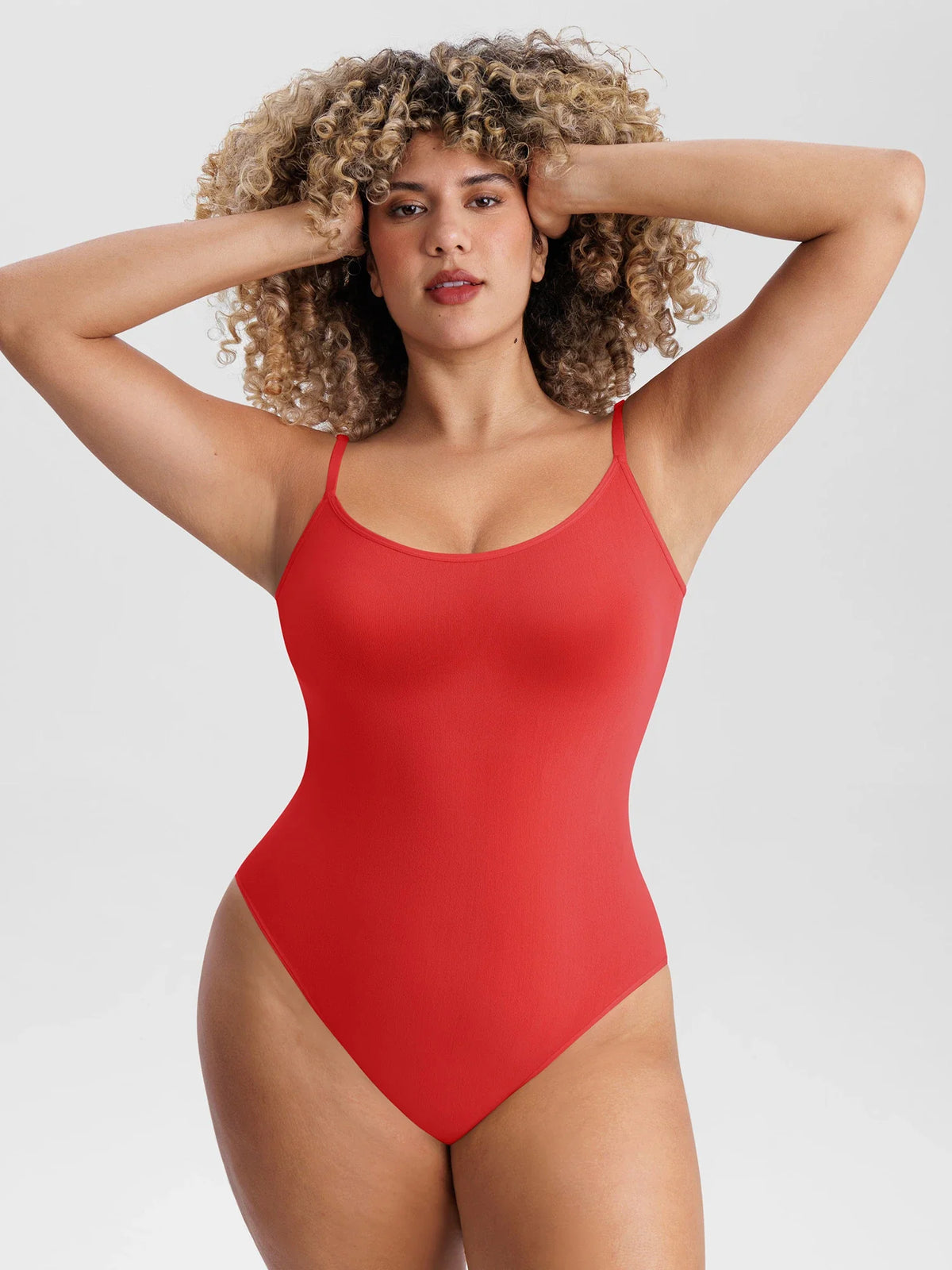 Lightweight seamless mesh bodysuit designed for sculpting comfort, breathable support, and all-day styling.
