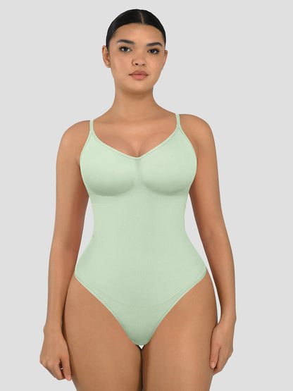 Seamless shapewear bodysuit with tummy control and thong design—lightweight, invisible under clothes, and designed for all body types for everyday wear, office, or parties.
