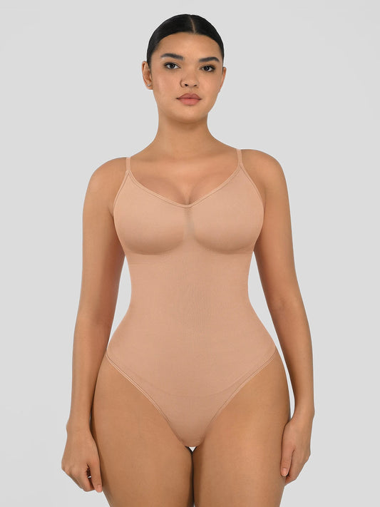 Seamless shapewear bodysuit with tummy control and thong design—lightweight, invisible under clothes, and designed for all body types for everyday wear, office, or parties.