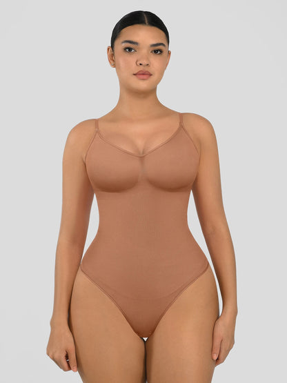 Seamless shapewear bodysuit with tummy control and thong design—lightweight, invisible under clothes, and designed for all body types for everyday wear, office, or parties.
