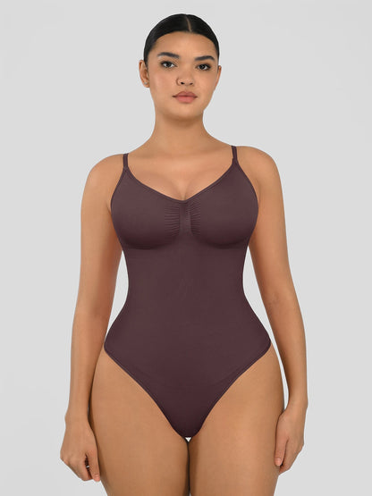 Seamless shapewear bodysuit with tummy control and thong design—lightweight, invisible under clothes, and designed for all body types for everyday wear, office, or parties.