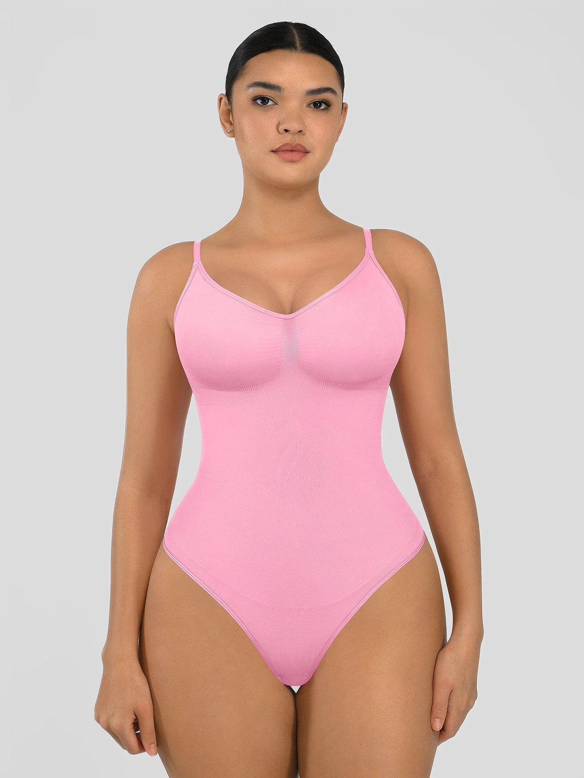 Seamless shapewear bodysuit with tummy control and thong design—lightweight, invisible under clothes, and designed for all body types for everyday wear, office, or parties.