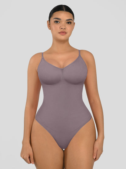Seamless shapewear bodysuit with tummy control and thong design—lightweight, invisible under clothes, and designed for all body types for everyday wear, office, or parties.