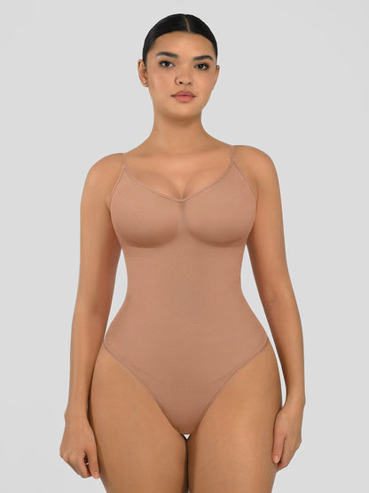 Seamless shapewear bodysuit with tummy control and thong design—lightweight, invisible under clothes, and designed for all body types for everyday wear, office, or parties.
