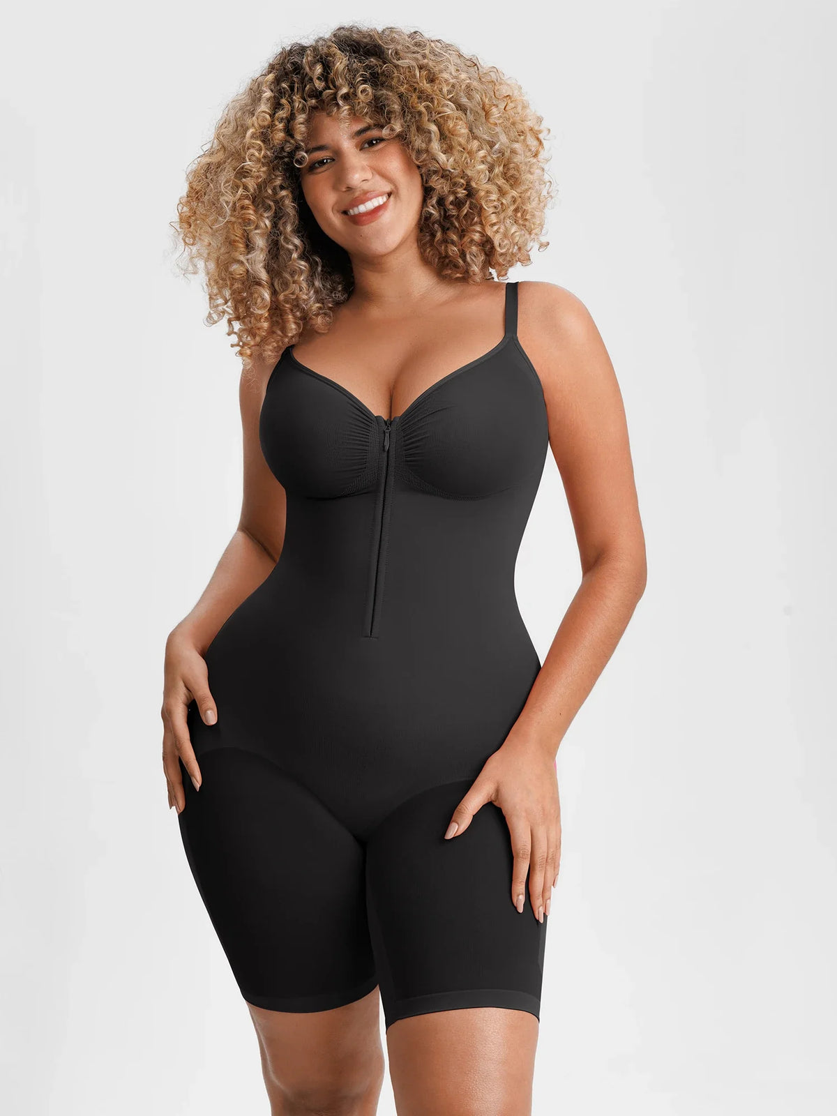 Seamless tummy control bodysuit with front zipper and inner hooks for easy wear and secure fit. Smooth compression shapes waist and tummy while staying invisible under clothes. Butt-lifting design enhances curves and smooths leg lines. Ruched bust adapts to different cup sizes. Soft breathable stretch fabric with adjustable straps and gusset for all-day comfort. 