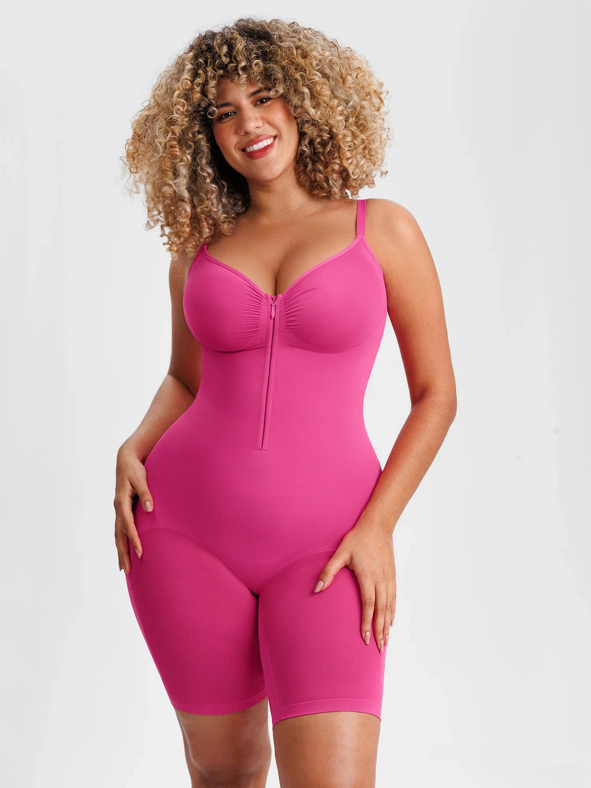 Seamless tummy control bodysuit with front zipper and inner hooks for easy wear and secure fit. Smooth compression shapes waist and tummy while staying invisible under clothes. Butt-lifting design enhances curves and smooths leg lines. Ruched bust adapts to different cup sizes. Soft breathable stretch fabric with adjustable straps and gusset for all-day comfort. 