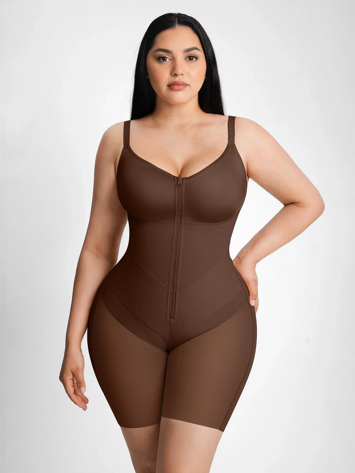 Full-body front view of a model in a brown tummy control shaping bodysuit with full chest coverage and targeted waist compression