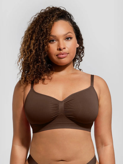 Front view of a model in a brown wire-free unlined soft bra offering padding-free natural fit and light support