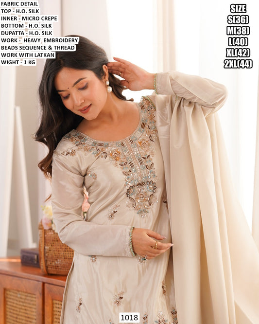 Title: Elegant Heavy Embroidered H.O. Silk Suit Set with Dupatta – Premium Festive Wear